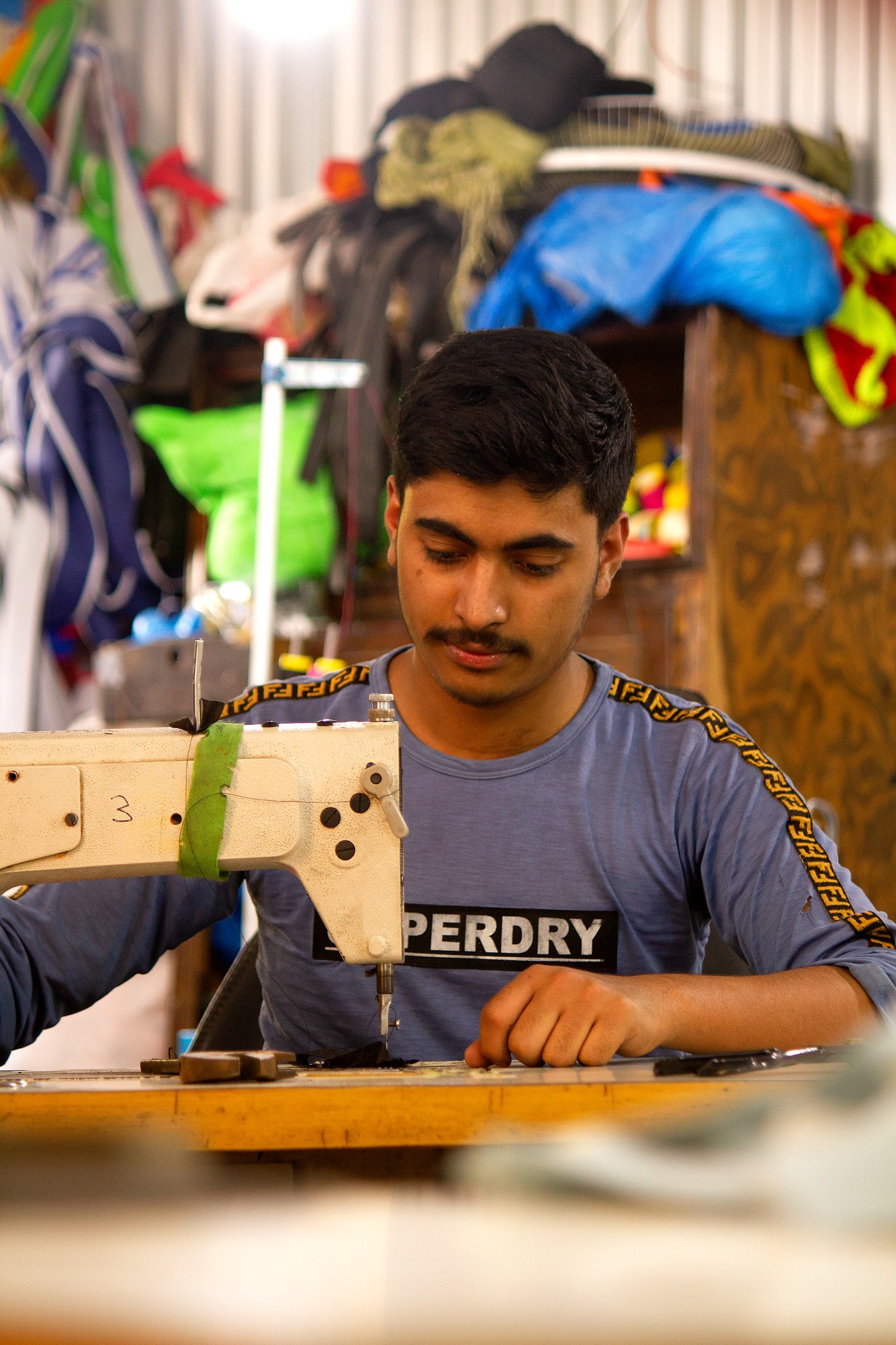 Artisan Craftsman at Sewing Station - Eco Promotional Industries Lalitpur